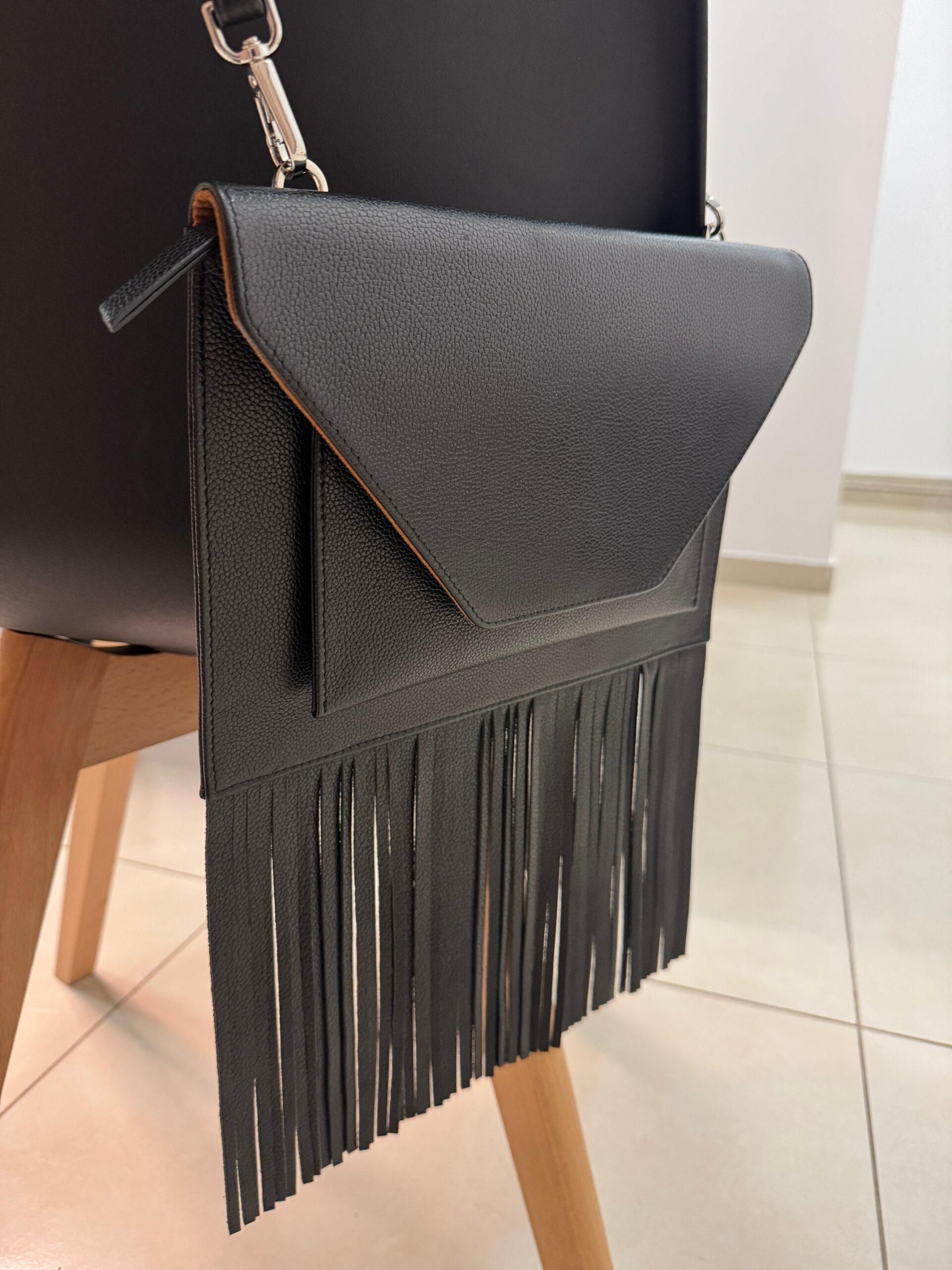 WI:RE clutch leather bag with fringe