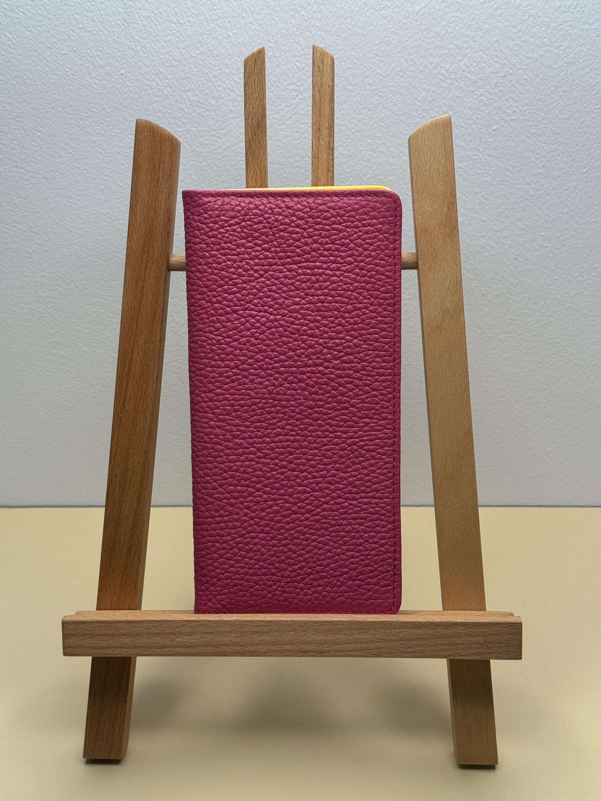 Pink vertical leather wallet