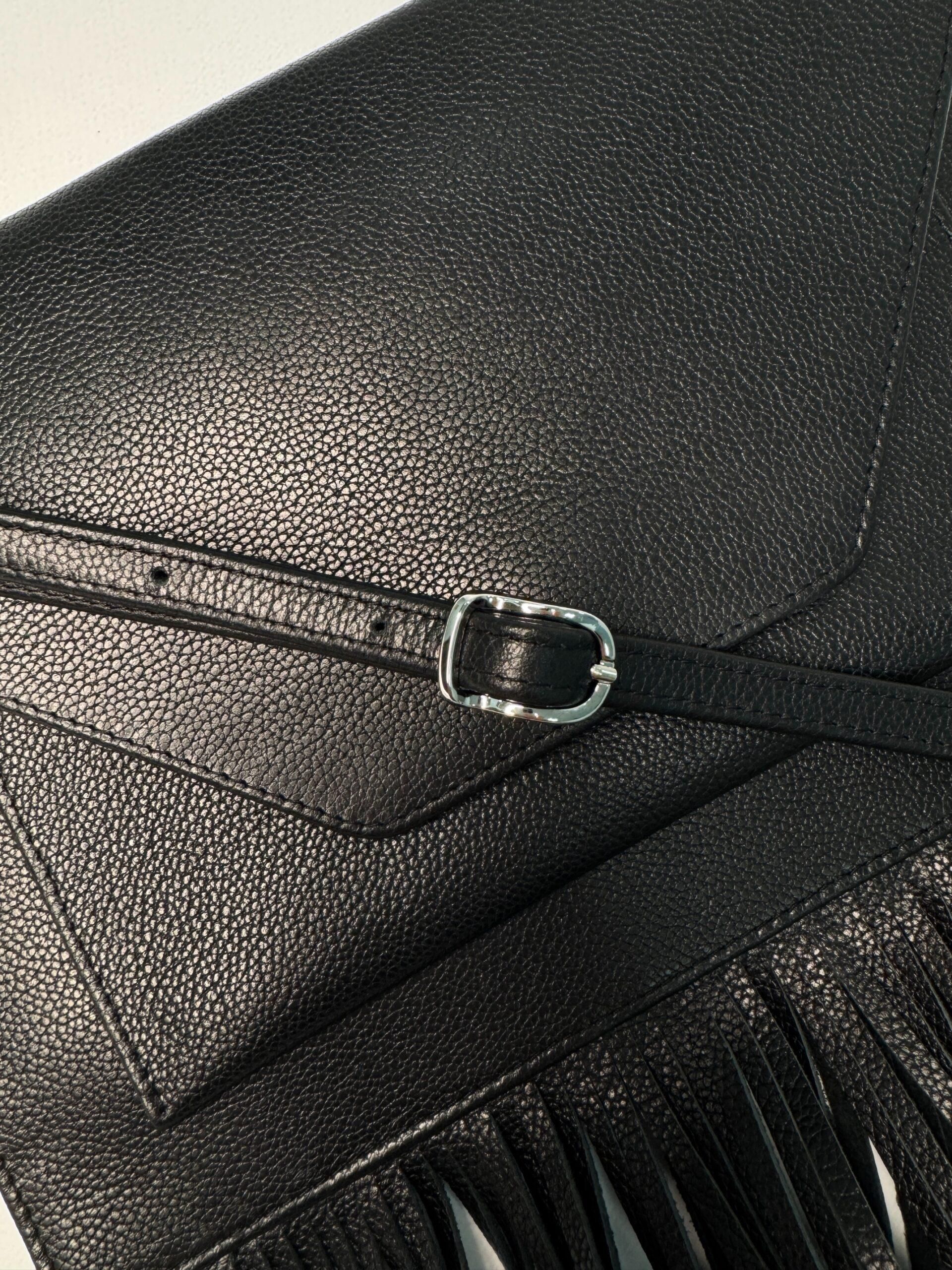 WI:RE clutch leather bag with fringe