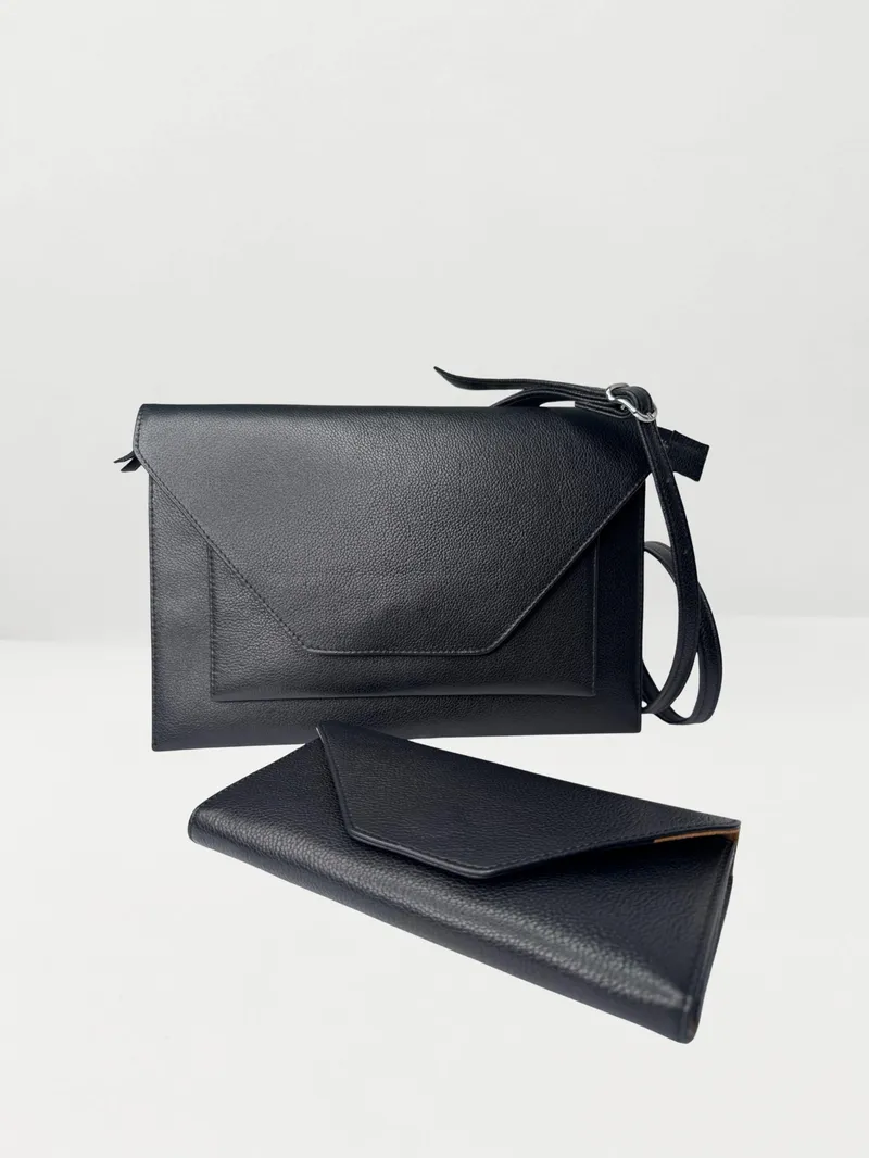 C:REO clutch leather bag